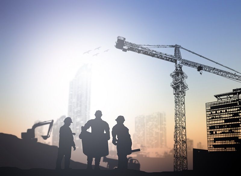 silhouette engineer in a building site over Blurred constructio Nov 1 L comp