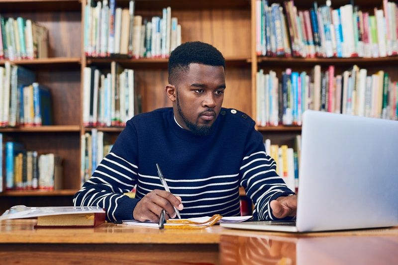 Doing-his-research-to-get-top-marks-cm