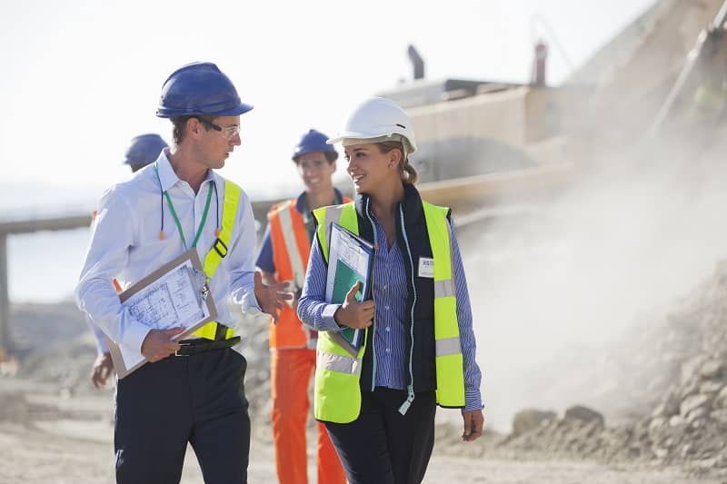 Business people talking in quarry -cm