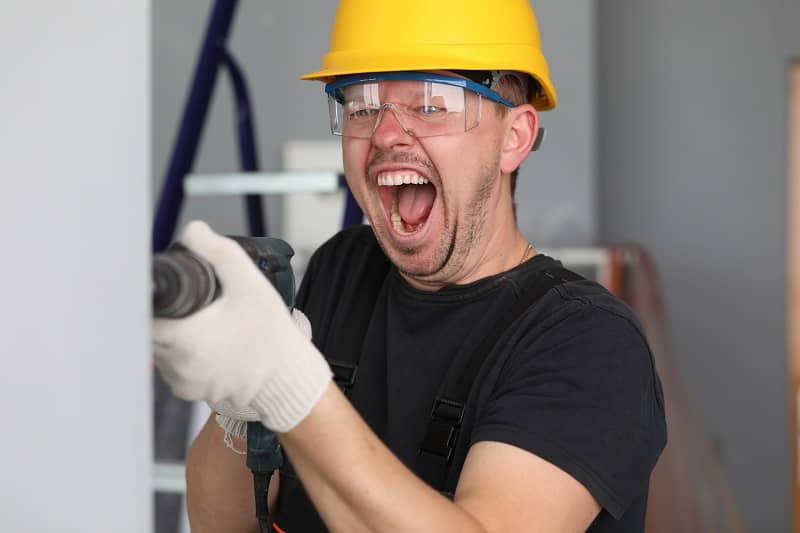 Handyman make hole with device-cm