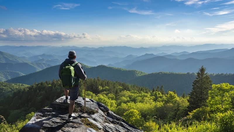 Man relaxing on hiking trip in the mountains-cm