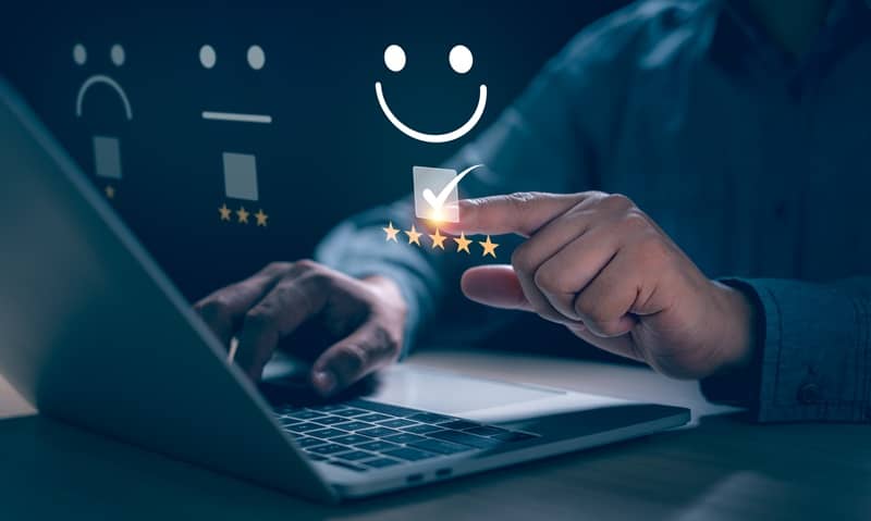 Business people touch virtual screens on the happy Smile face icon-cm